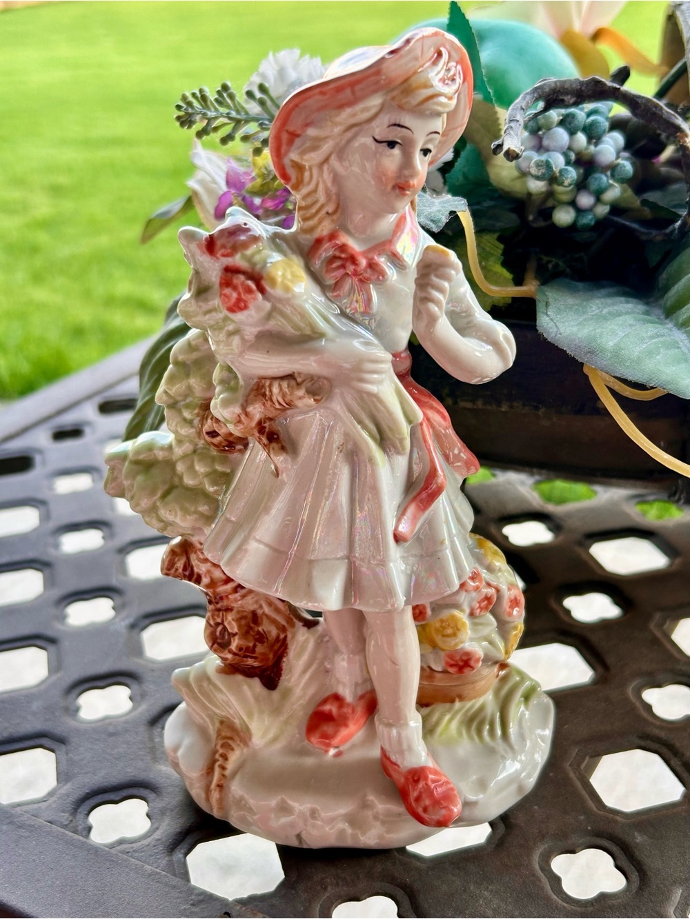 Vintage glazed ceramic girl with flowers